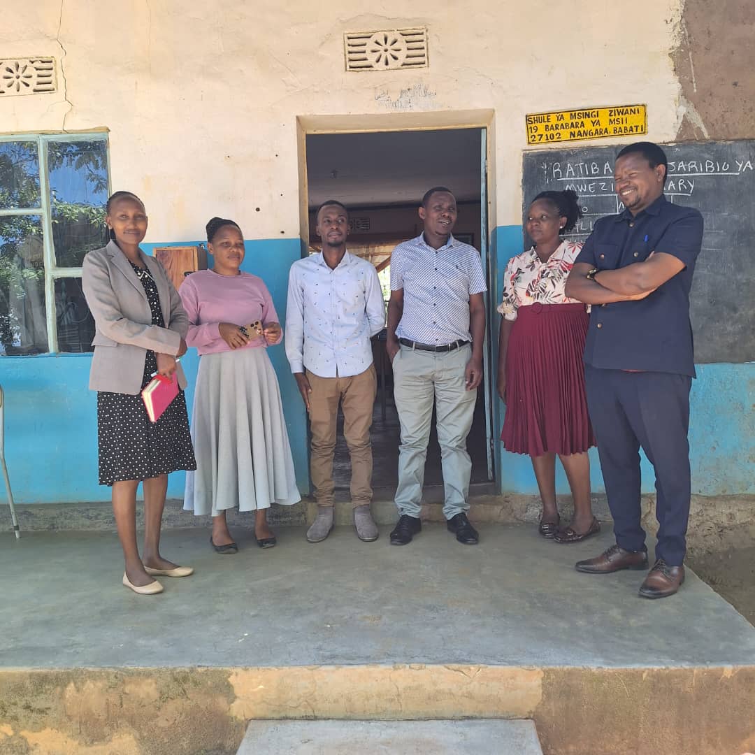 THA SF leaders with teachers at Nangara Secondary  Babati Manyara.